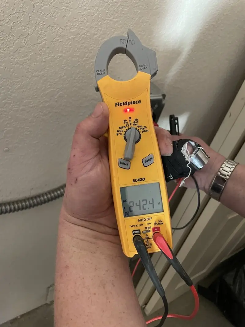 Voltage testing with clamp meter during Circuit Breaker Repair in Smyrna
